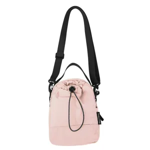 Pink drawstring bucket bag detail showing the adjustable black cord closure and side tag.