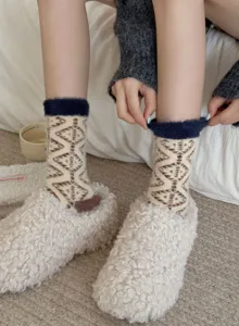 Cozy fuzzy coral fleece mid-tube socks featuring retro geometric pattern for winter.