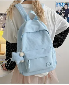 Light blue plaid casual school backpack with plush star pendant for daily commute.
