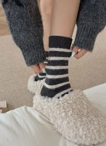Women thick warm wool striped mid-tube socks with speckle yarn, winter cozy wear detail.