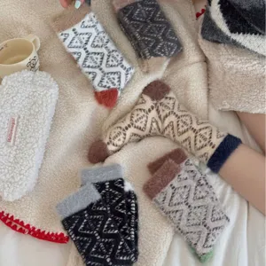 Thickened coral fleece mid-tube socks for women, cozy warm winter sleep socks.