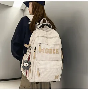 Fashion grid student backpack with large capacity, stylish college style for daily school use.