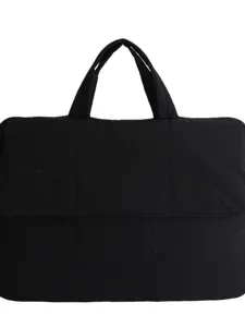 Black quilted laptop bag padded briefcase stylish business commuting tote handbag main view