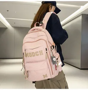 Pink grid student backpack detail view, multi-pocket design, perfect for daily casual wear.