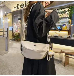 Casual canvas crossbody chest bag for women, stylish everyday fashion shoulder waist bag.
