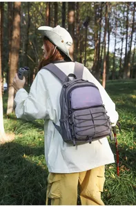 Large capacity college style two-tone backpack for travel, hiking, and daily school use.