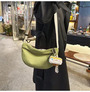 Japanese ins harajuku candy color casual sports nylon crescent shoulder crossbody bag detail.