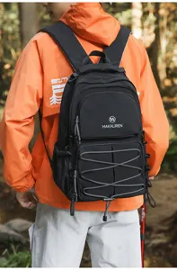 Detailed view of the black travel backpack showcasing large capacity and durable outdoor design.