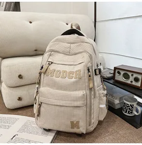 Beige plaid grid large capacity student backpack school bag detail view showcasing fashion style
