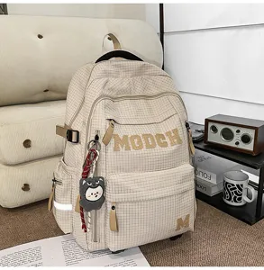 Stylish plaid backpack with large capacity for students, trendy college style school bag with letters.