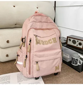 Pink grid student rolling backpack large capacity school bag for girls youth daily wear.