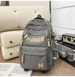 Gray grid student school backpack with large capacity and rolling wheels for daily use.