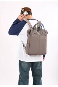 Zaino in tinta unita alla moda, grande capacità borsa per laptop da viaggio quotidiano.