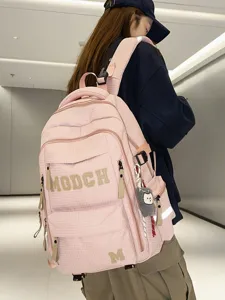 Pink large capacity school backpack for students, stylish college style bookbag with letter design.