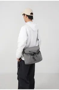Casual tactical messenger bag for men and women, large capacity stylish canvas shoulder bag.