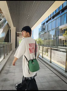 Casual nylon drawstring bucket bag lightweight green grid crossbody bag for daily travel hiking