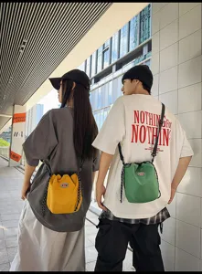 Casual nylon drawstring bucket bag for daily travel and outdoor activities, stylish.