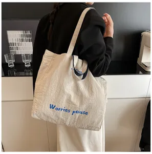Borsa shopper in tela casual con stampa di lettere e grande capacità per l'uso quotidiano.