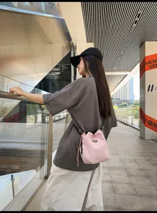 Casual lightweight nylon candy color drawstring bucket bag for women, ideal for travel and daily use.