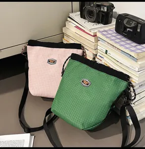 Casual lightweight nylon candy color unisex drawstring bucket bag travel shoulder crossbody bag