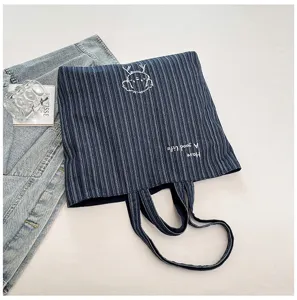 Borsa shopper in denim a righe blu scuro, borsa a spalla casual di grande capacità per uso quotidiano.