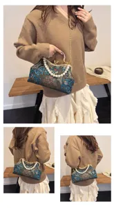 Sac de soirée brodé de style ethnique avec poignée de perles et bandoulière chaîne.
