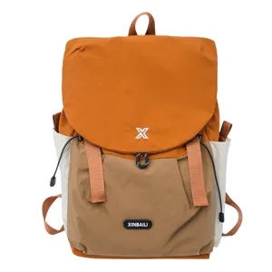 Sac à dos décontracté grande capacité color-block pour voyage en plein air, léger et sport durable.