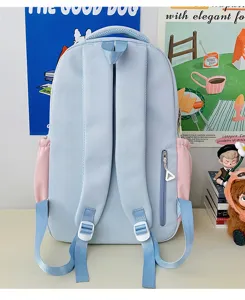 Detailed view of cute candy color colorblock school backpack, fresh student style, sweet aesthetic.