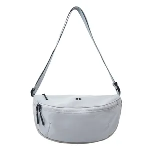 Casual minimalist half-moon crossbody sling bag light grey stylish daily shoulder bag