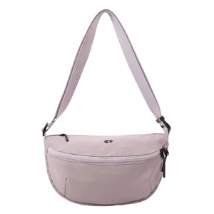 Casual crescent sling bag for women, trendy lavender crossbody chest and waist purse.