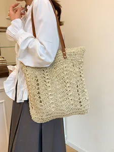 Borsa shopper in paglia minimalista da donna, grande borsa a spalla per vacanze al mare.