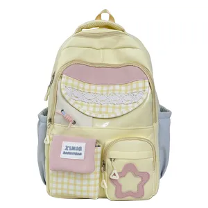 Detailed view of sweet Japanese style candy color school backpack with cute plaid and pocket.