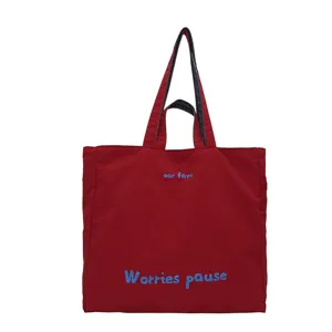 Borsa tote in tela rossa con stampa blu, grande borsa casual per il lavoro e il tempo libero quotidiano.