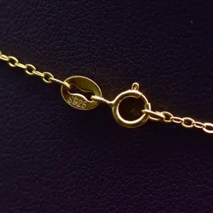 Gold plated sterling silver necklace clasp detail showcasing S925 hallmark stamp