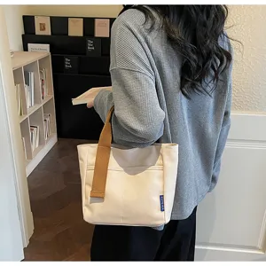 Borsa tote in tela casual minimalista per donna, elegante borsa a mano quotidiana.