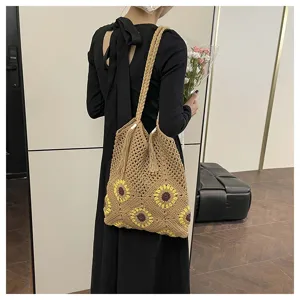Sac cabas en tricot ajouré avec motif tournesol élégant pour les vacances à la plage.