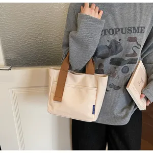 Borsa tote in tela minimalista casual da donna, perfetta per lo shopping e il tempo libero.