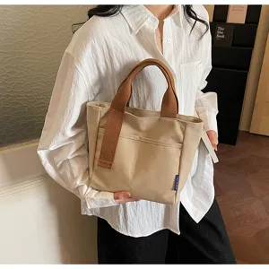 Borsa a mano minimalista casual in tela da donna, elegante borsa con tasca frontale.
