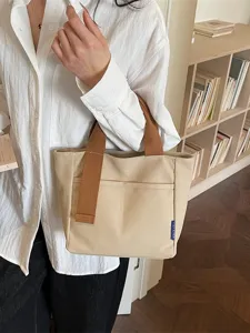Borsa tote in tela minimalista casual da donna, elegante borsetta con tasca frontale.