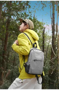 Mochila de nailon con estampado gris para viajes casuales y uso diario, unisex estilo.