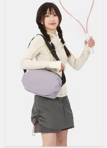 Casual minimalist nylon single shoulder crossbody bag worn by model, stylish candy color.