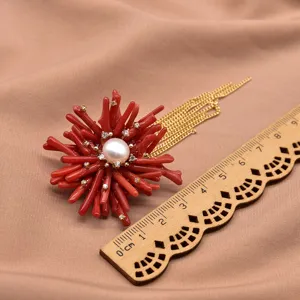 Elegant pearl coral flower brooch with gold fringe, stylish and exquisite main product view.