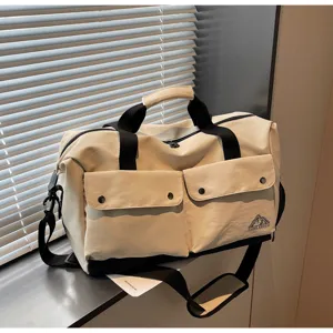 Große Canvas Reisetasche mit Doppeltaschen für Outdoor Fitness Sport und Wochenendtrips.