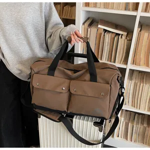 Grosse braune Reise-Duffeltasche, laessige Outdoor-Sport-Fitness-Handtasche Schultergepäck.
