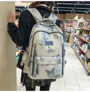 Grosse Kapazitaet Schueler Schulrucksack mit blauem Schmetterlingsdruck Design