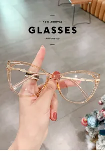 Stylish clear cat-eye blue light blocking glasses with metal temples for daily wear.