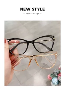 Close-up of stylish cat-eye glasses frames with metal temples, modern and elegant design.