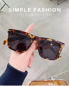 Close-up of stylish square anti-blue light glasses with gradient frame for daily wear.