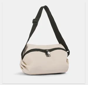 Casual nylon crossbody bag for women, lightweight dumpling shoulder bag with zipper.