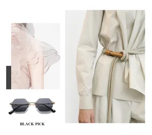 Detail view of trendy polygon rimless sunglasses paired with stylish fashion outfit scenes.
